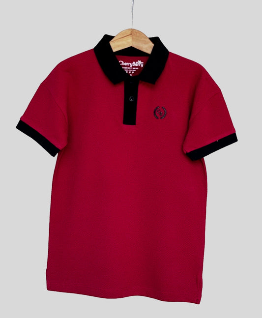 Boys' shirt featuring an oversized short sleeve polo shirt with a soft collar designed for a stylish and comfortable look