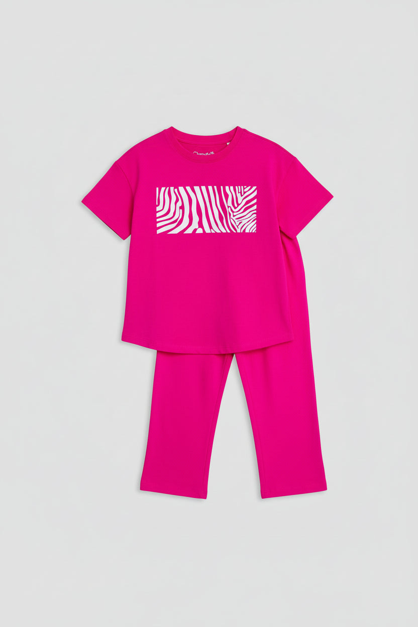 Girls' oversized t-shirt and trouser set with allover leopard print and loose fit
