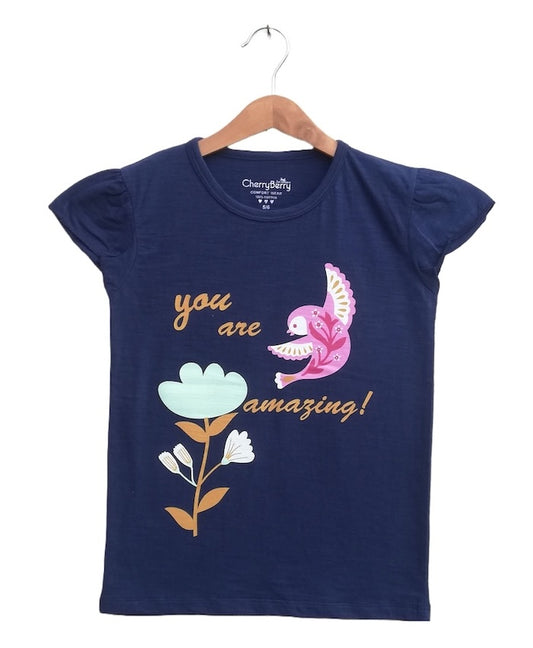 Soft cotton girls’ t-shirt featuring an inspiring "You Are Amazing" graphic print, perfect for everyday wear