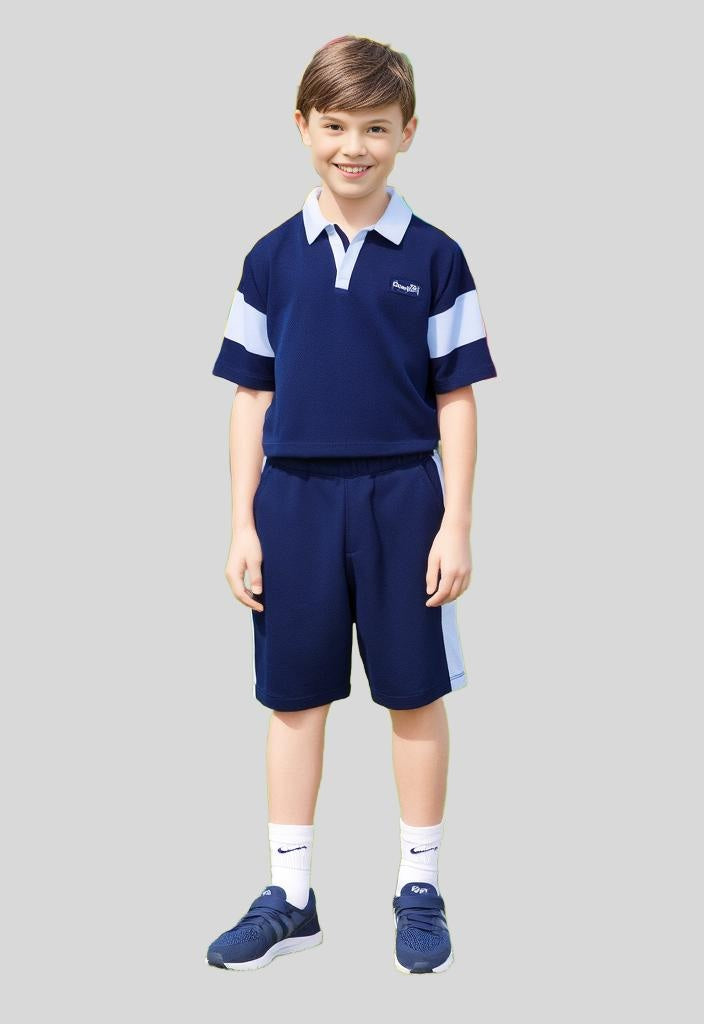 Trendy boys' oversized polo shirt and matching shorts set with a relaxed, fashion-forward fit