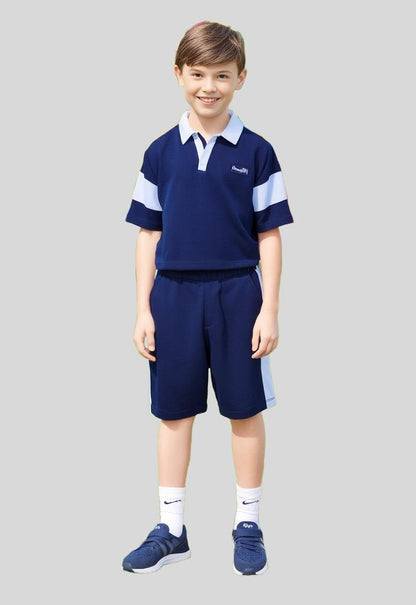 Trendy boys' oversized polo shirt and matching shorts set with a relaxed, fashion-forward fit