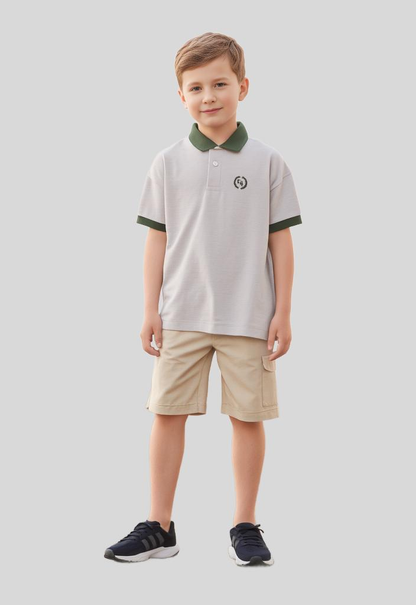 Oversized boys' polo shirt featuring a relaxed loose fit, drop shoulder seams, short sleeves, and a soft collar for a laid-back look
