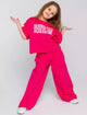 Trendy girls' leopard print oversized t-shirt and matching loose fit trousers for a bold, comfy look