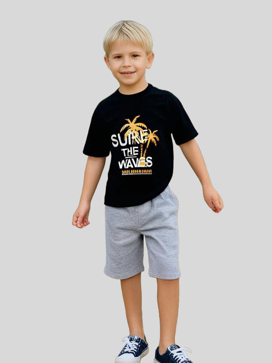 Cool boys’ cotton t-shirt and grey shorts set featuring a bold "Surf the Waves" graphic, perfect for summer style